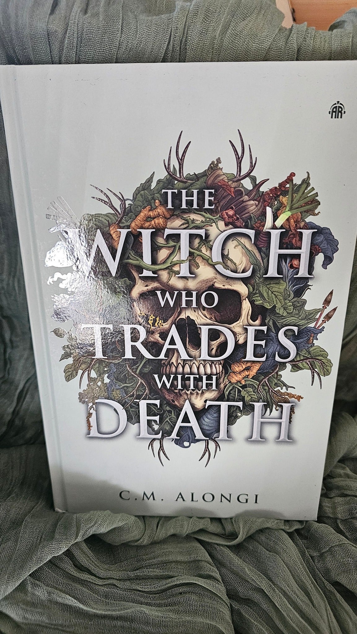 The Witch Who Trades With Dead by C.M. Alongi